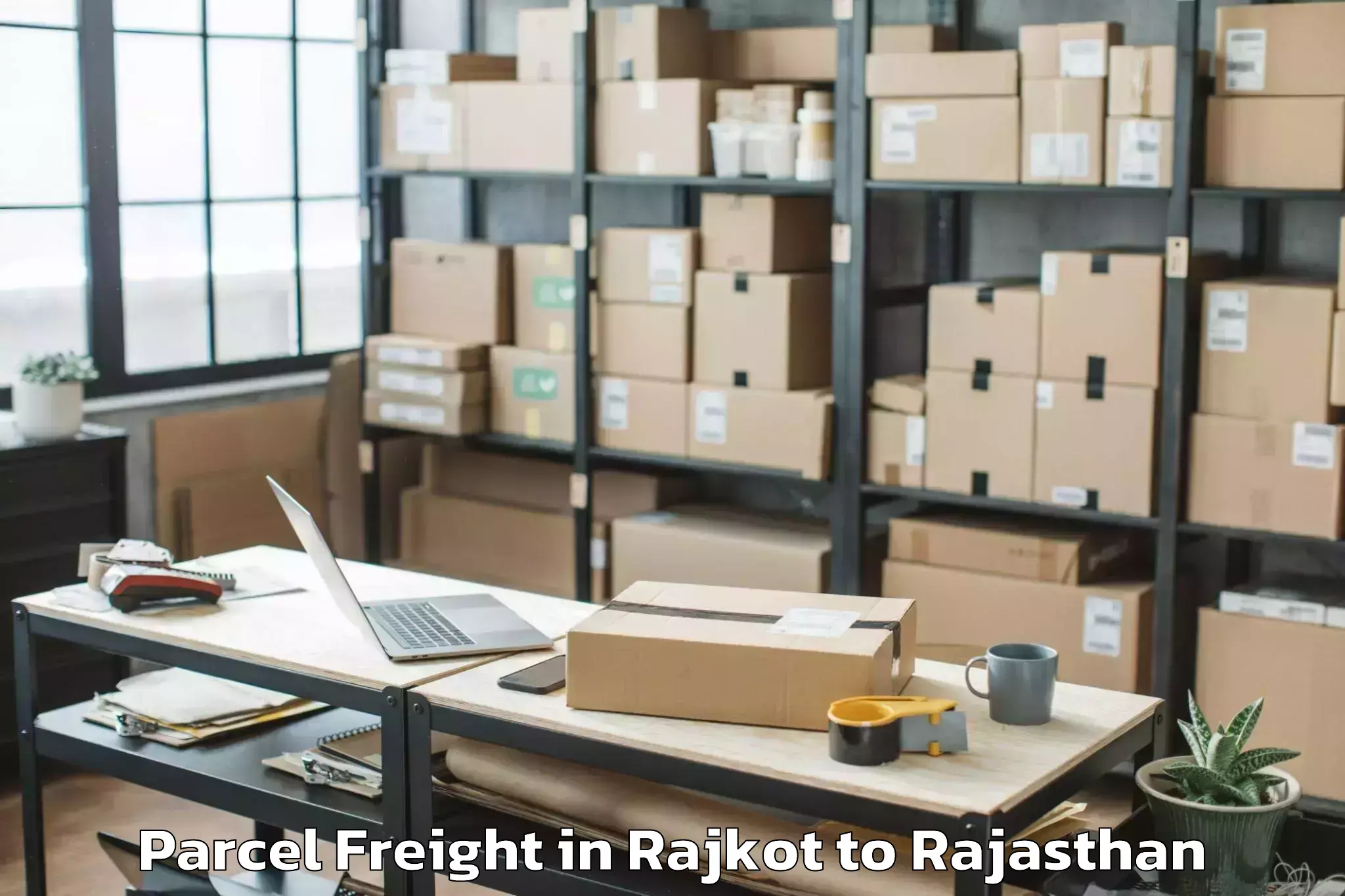 Top Rajkot to Borkhera Parcel Freight Available